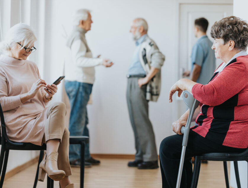 Patient Waiting In A Clinic Group of senior patients waiting in a clinc for the appointment